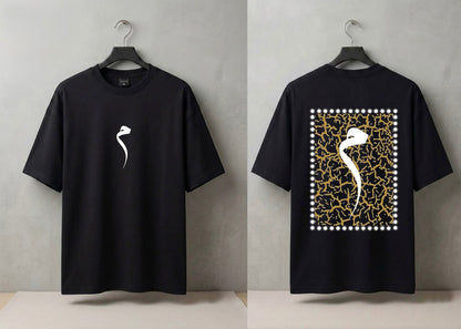A black short-sleeve t-shirt shown from both front and back on hangers against a light gray wall. The front has a small white curved graphic on the left chest, and the back features a large square graphic with a white bird silhouette over a gold crackle pattern bordered by white dots.