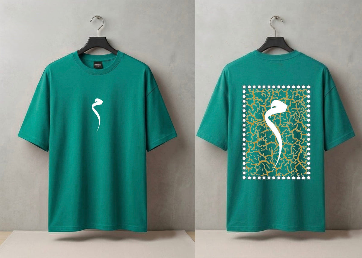 A teal green short-sleeve t-shirt shown from both front and back on black hangers against a textured gray wall. The front features a small white abstract bird-like graphic on the left chest.